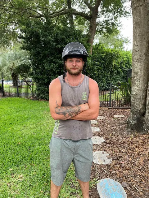 Garrett Forshee, crew lead at Forshee's Tree Service, on a job site