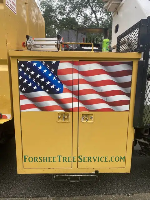 Forshee's Tree Service equipment staged on a job site